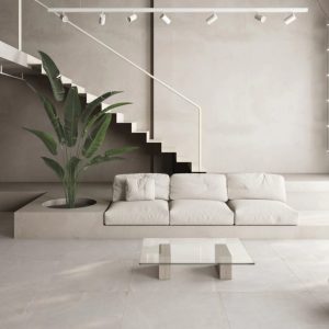 MONREALE - Woonkamer met lichte betonlook op vloer en wand, Pamesa
