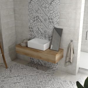 At.alpha - Badkamer met grijs-wit patroon en betonlook op vloer en wand, Pamesa