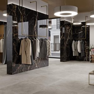 Lux laurants - Winkel en showroom met zwarte marmerlook en lichte betonlook op wand en vloer, Pamesa
