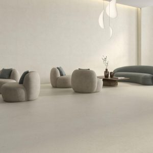 Crema marfil - Woonkamer met beige betonlook op vloer, Pamesa