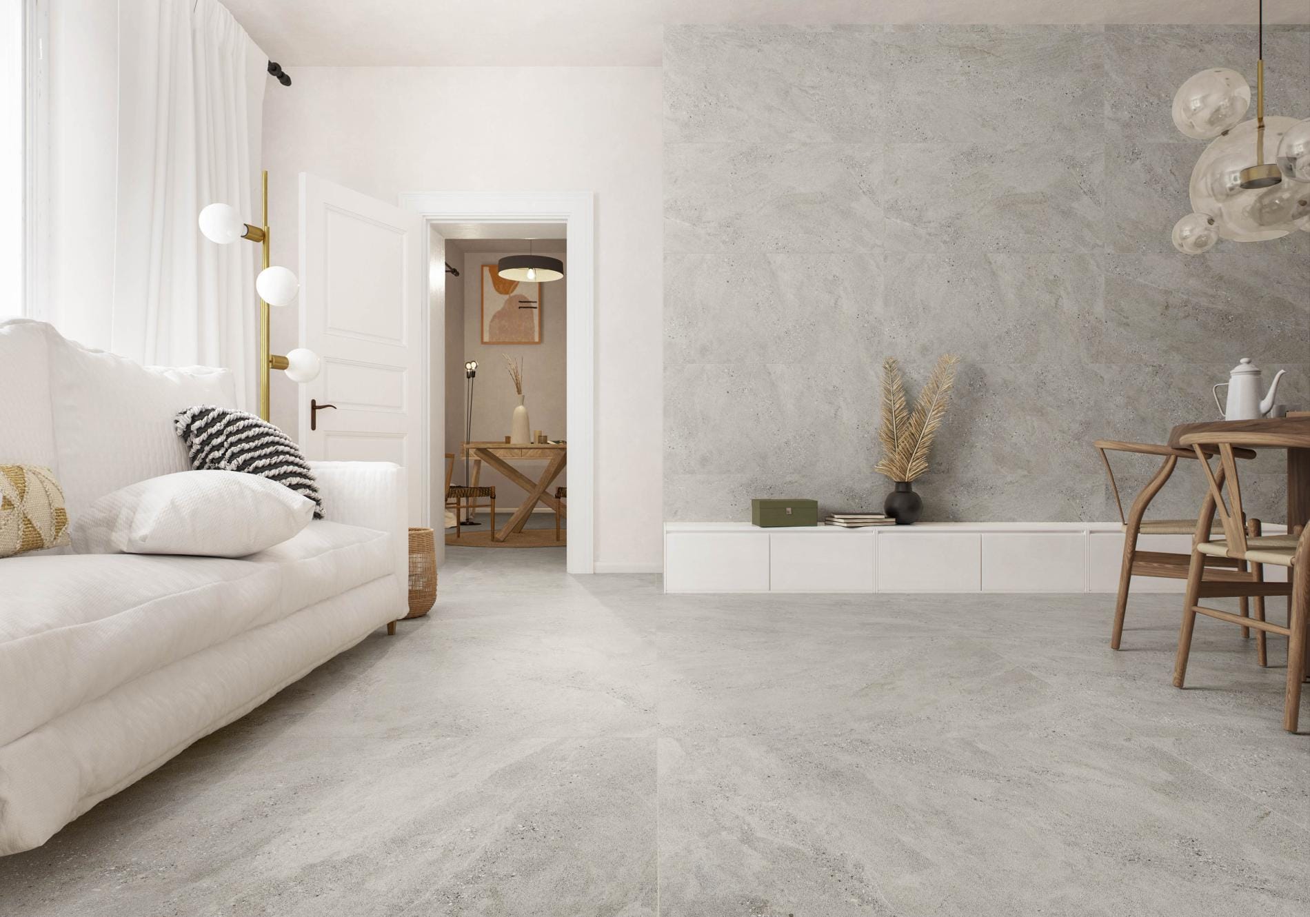 Souland - Woonkamer en keuken met lichte betonlook op vloer en wand, Pamesa