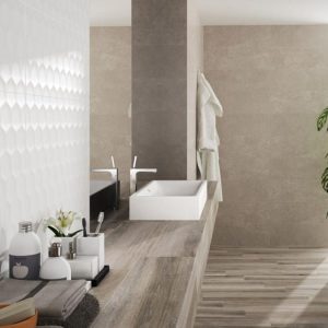 WHITES TRIPOLI - Badkamer met witte reliëftegel en grijze betonlook op wand en vloer, Pamesa