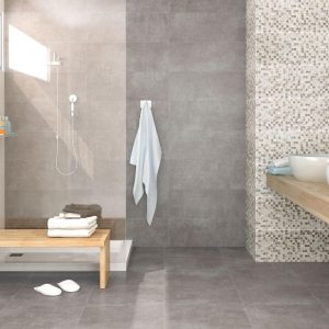 At.alpha - Badkamer met grijze betonlook en terrazzo op vloer en wand, Pamesa