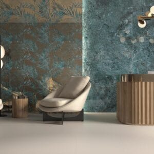 CR. Lux Kionia - Hotelreceptie met groenblauw botanisch decor en betonlook op wand en vloer, Pamesa