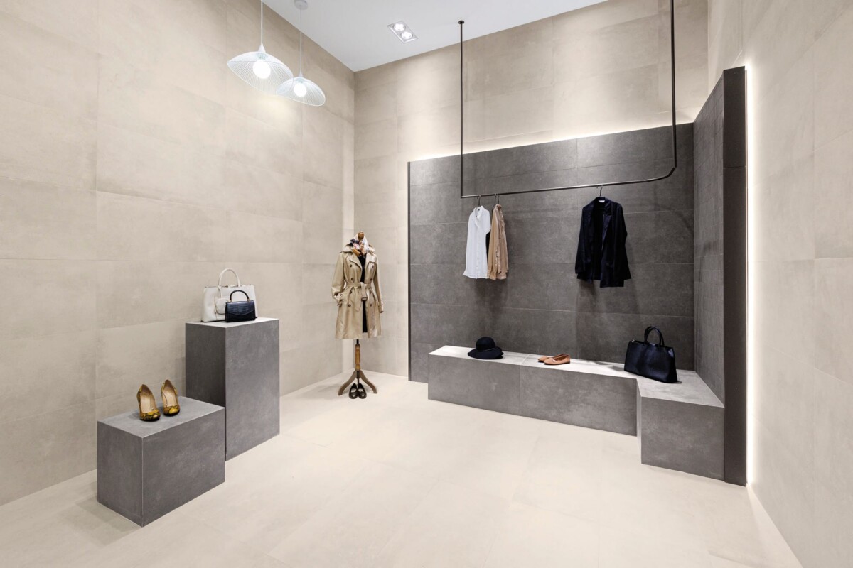 Flow - Winkel en showroom met grijze betonlook op vloer en wand, Aleluia